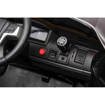 Masinuta electrica cu roti EVA si scaun din piele Toyota Landcruiser Red