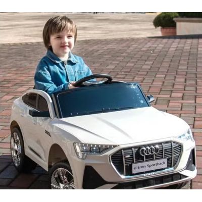 Masinuta electrica pentru copii cu licenta Audi E-Tron Sportback White cu telecomanda 2.4G, acumulator 12V4.5Ah,motoare 80w,lumini led,muzica,pornire la buton,usi cu deschidere,mp3usb,functie swing,3 viteze din telecomanda
