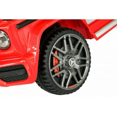 Masinuta electrica pentru copii Novokids Mercedes G63 AMG Rosu, roti din cauciuc Eva, melodii si USB, usi cu deschidere, 12V, 2 viteze, lungime 120 cm, 2 motoare 550 W